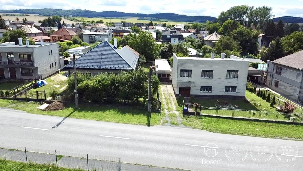 BOSEN | Rezervované, Priestranný rodinný dom s garážou, záhradou v meste Fiľakovo.