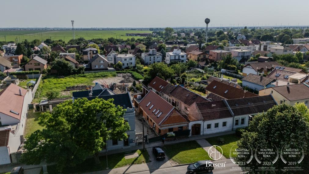 BOSEN | Na predaj:  Pozemok určený na stavbu RD,  Rusovce