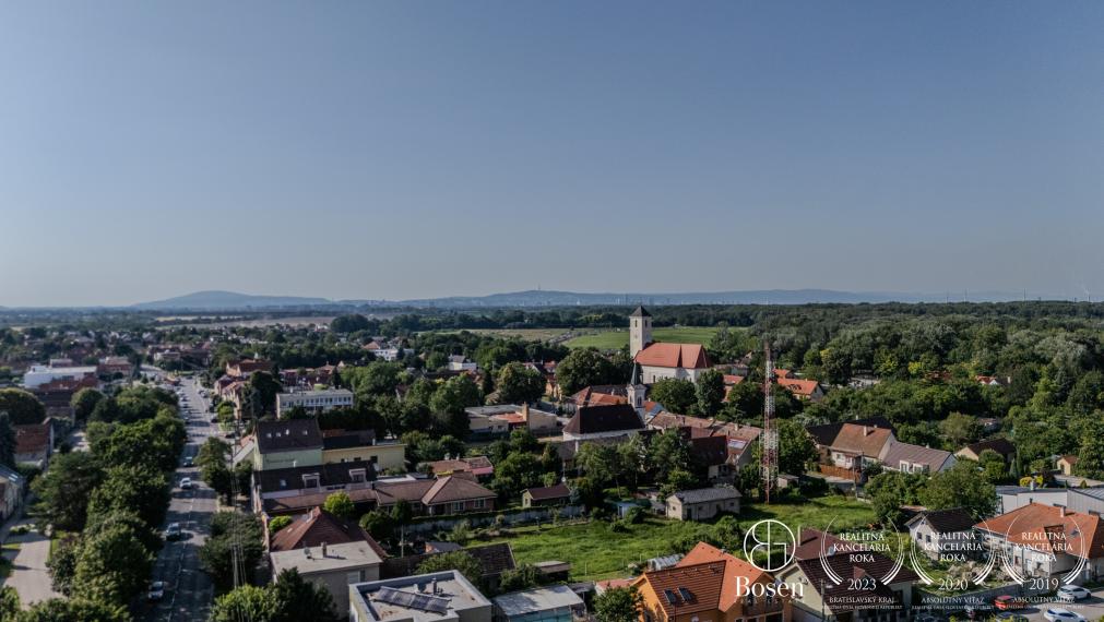 BOSEN | Na predaj:  Pozemok určený na stavbu RD,  Rusovce