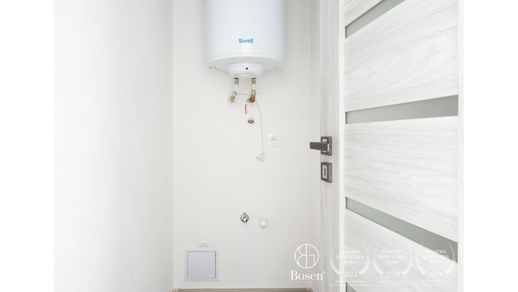 BOSEN | Na predaj priestranný 4-izbový rodinný dom v obci Kostolné Kračany