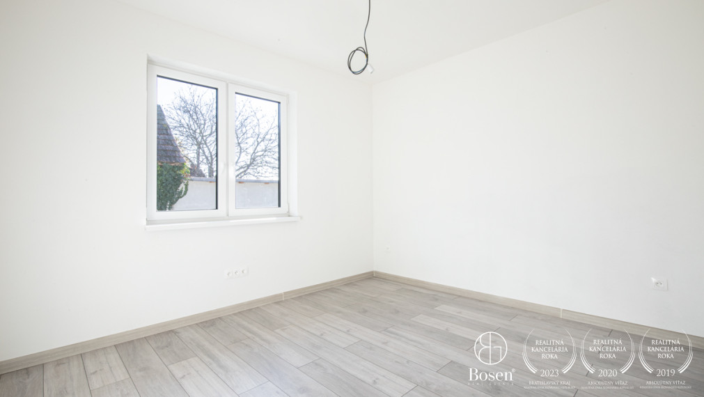 BOSEN | Na predaj priestranný 4-izbový rodinný dom v obci Kostolné Kračany