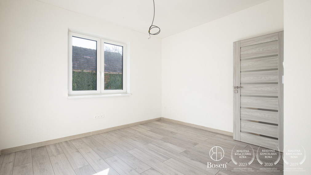 BOSEN | Na predaj priestranný 4-izbový rodinný dom v obci Kostolné Kračany