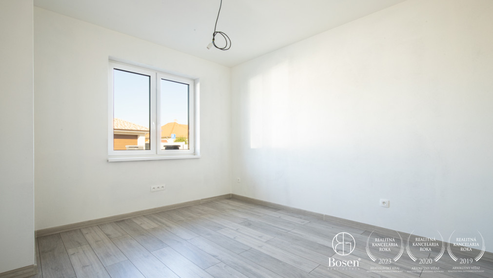 BOSEN | Na predaj priestranný 4-izbový rodinný dom v obci Kostolné Kračany